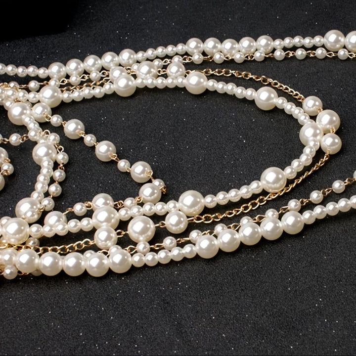 Boho pearl statement set styled on a mannequin neck form