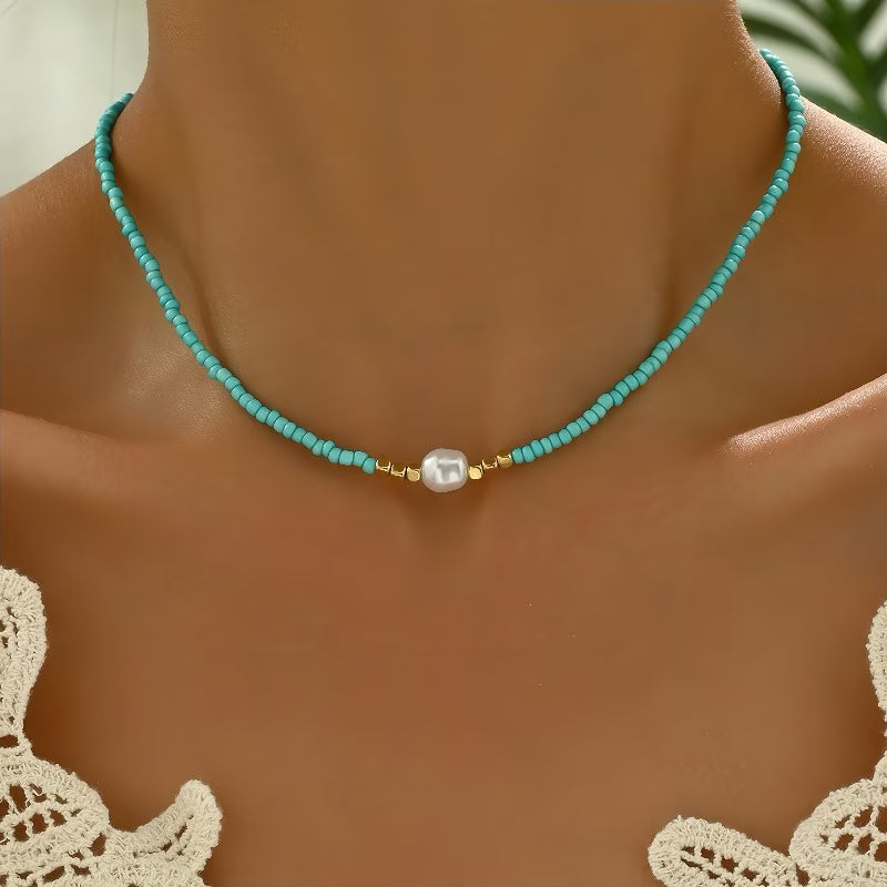 Model wearing the minimal pearl necklace