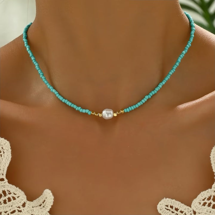 Model wearing the minimal pearl necklace