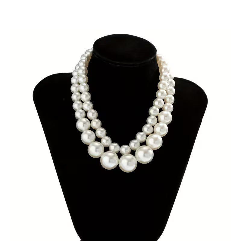 Side view highlighting the necklace's statement volume