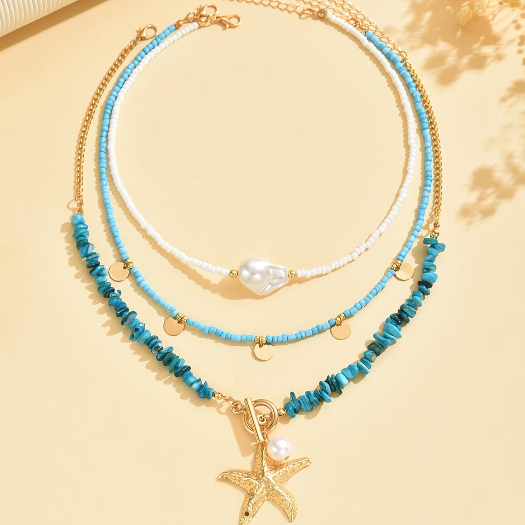 Necklace worn on a model highlighting the coastal style
