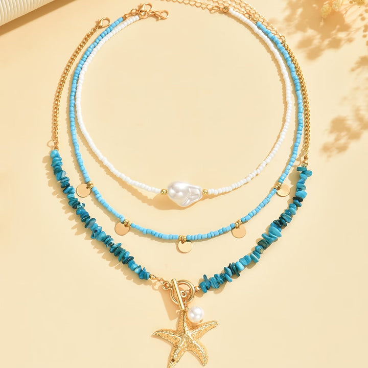 Necklace worn on a model highlighting the coastal style