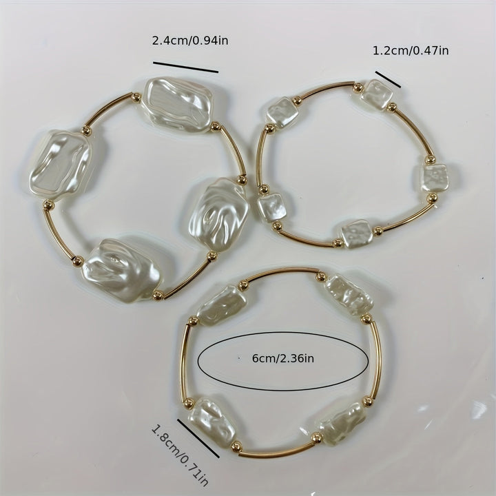 Bracelet set styled on a jewellery tray with soft lighting