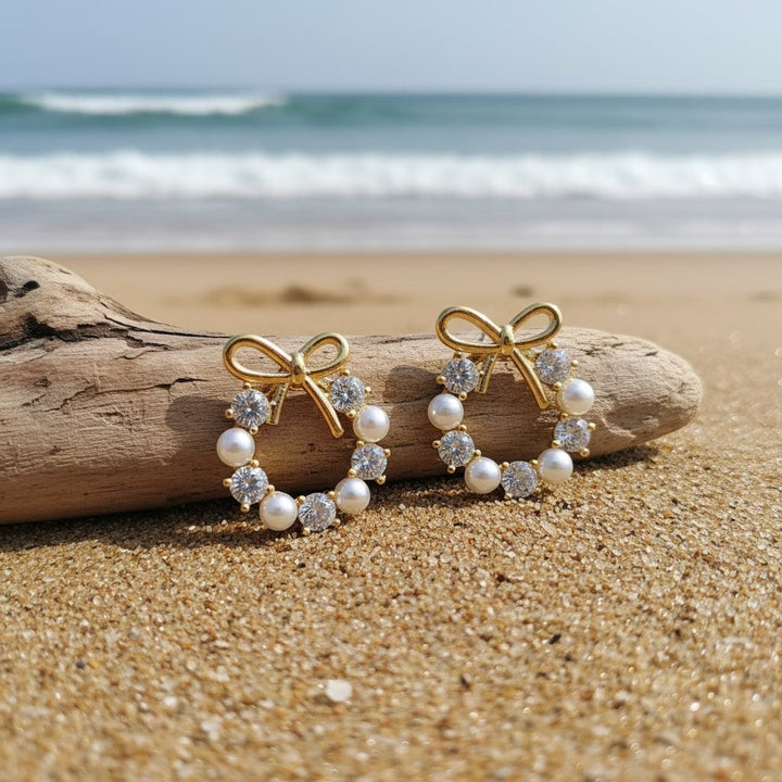 Earrings worn on a model's ear