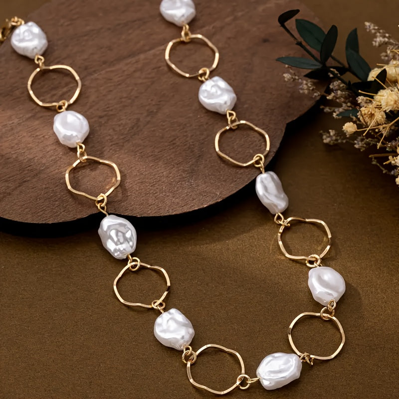 Close-up of the irregular baroque pearls linked together