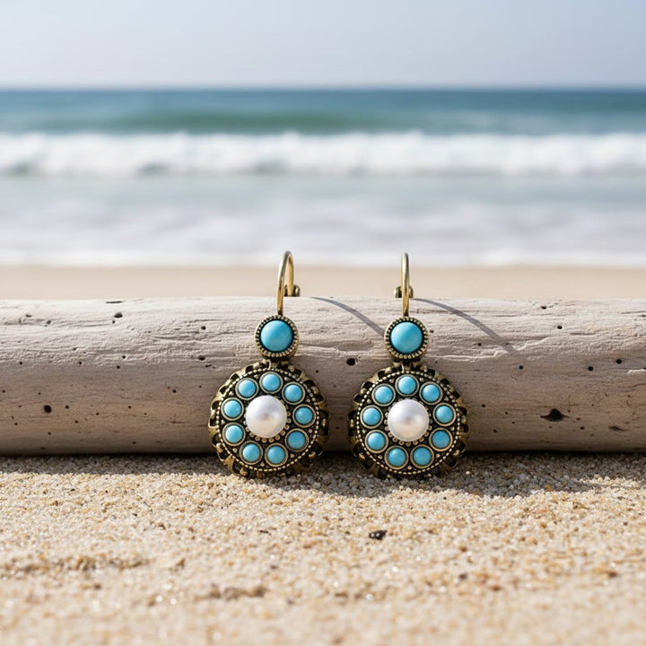 Earrings worn on a model's ear