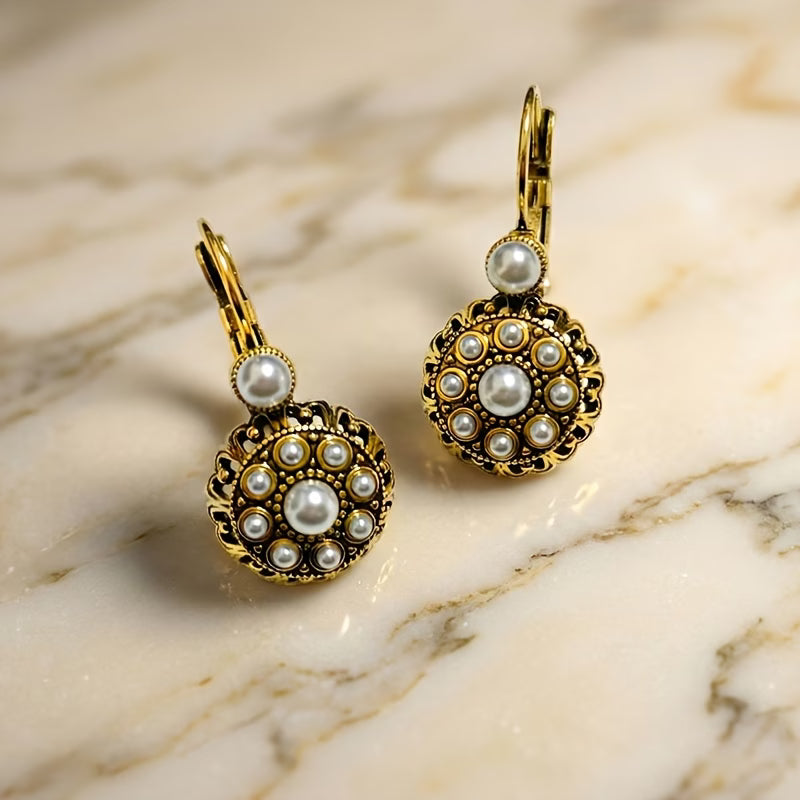 Earrings worn on a model's ear