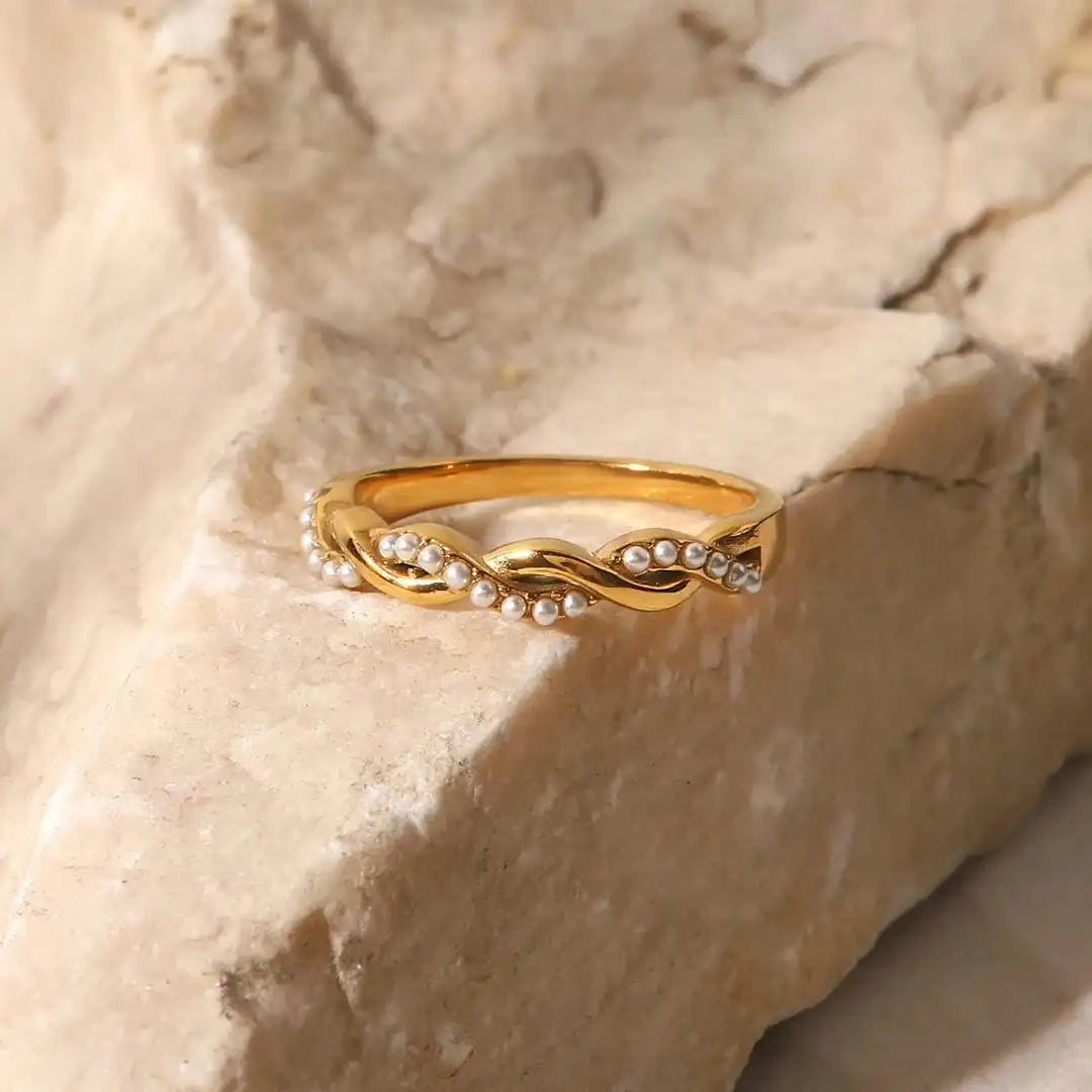 Main shot of the dainty twisted pearl stacking ring