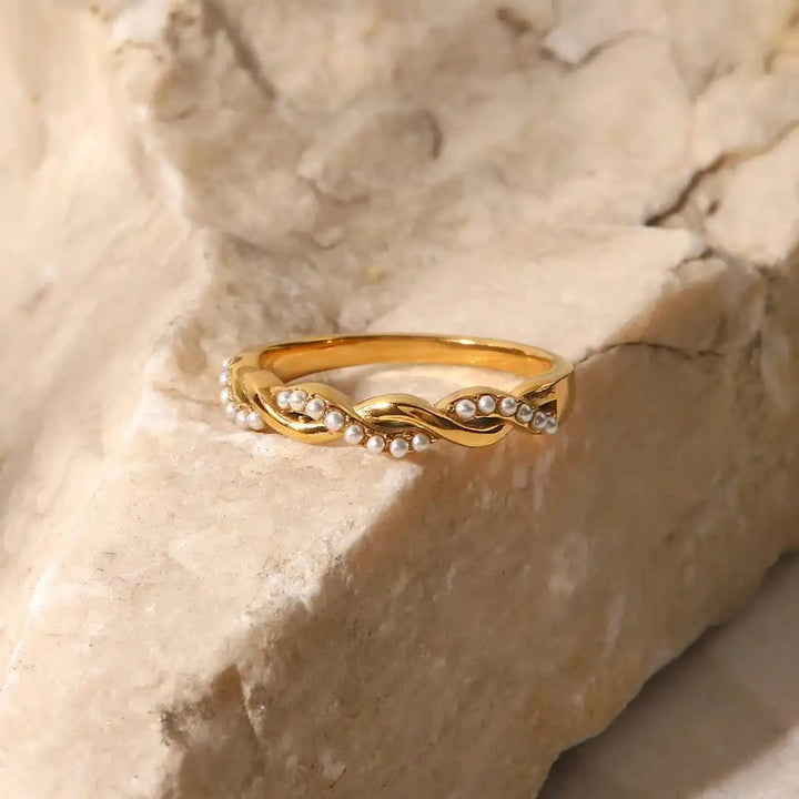 Main shot of the dainty twisted pearl stacking ring