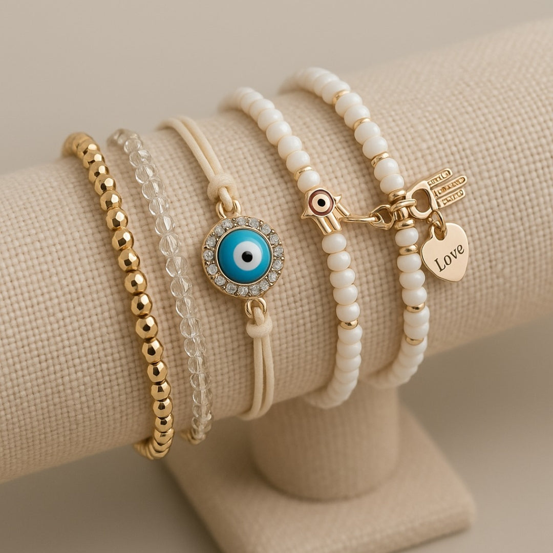 Close-up of the hamsa charm on one bracelet from the bundle