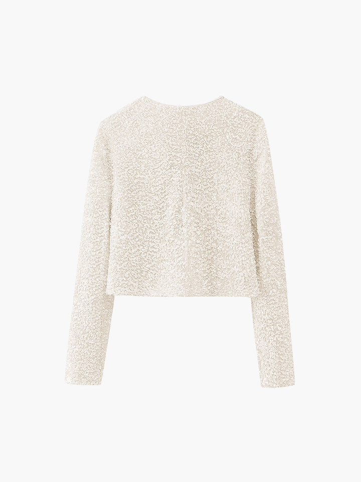Back view of the cream sequined cropped jacket with round neckline, flat shot