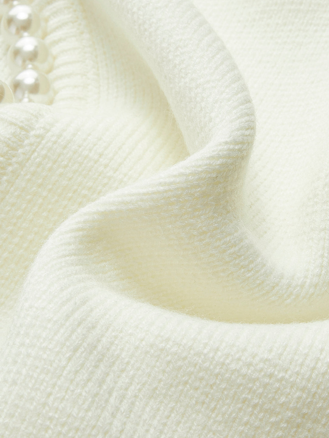 Pearl Trim Ripped Hem Cardigan - women's cardigan, model wearing it, three-quarter view