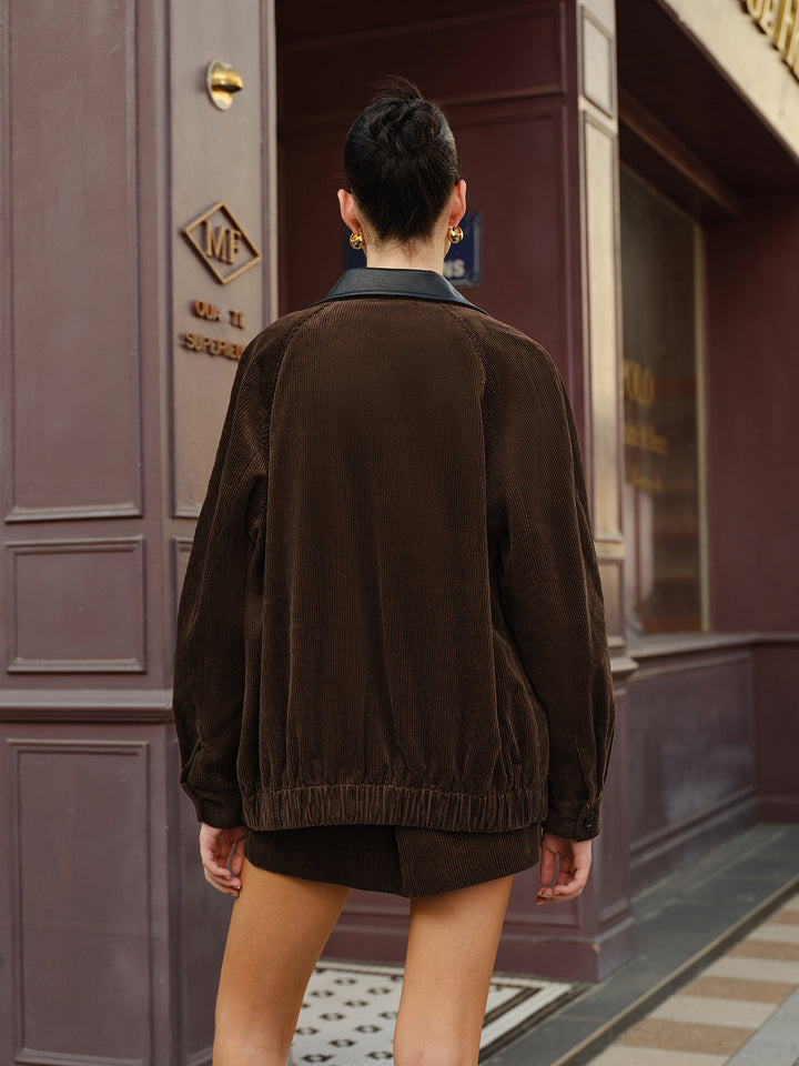 Back of the oversized corduroy jacket showing elasticated hem and wide ribbed texture
