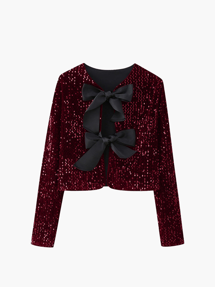 Burgundy sequinned velvet jacket with black bow detail, cropped silhouette