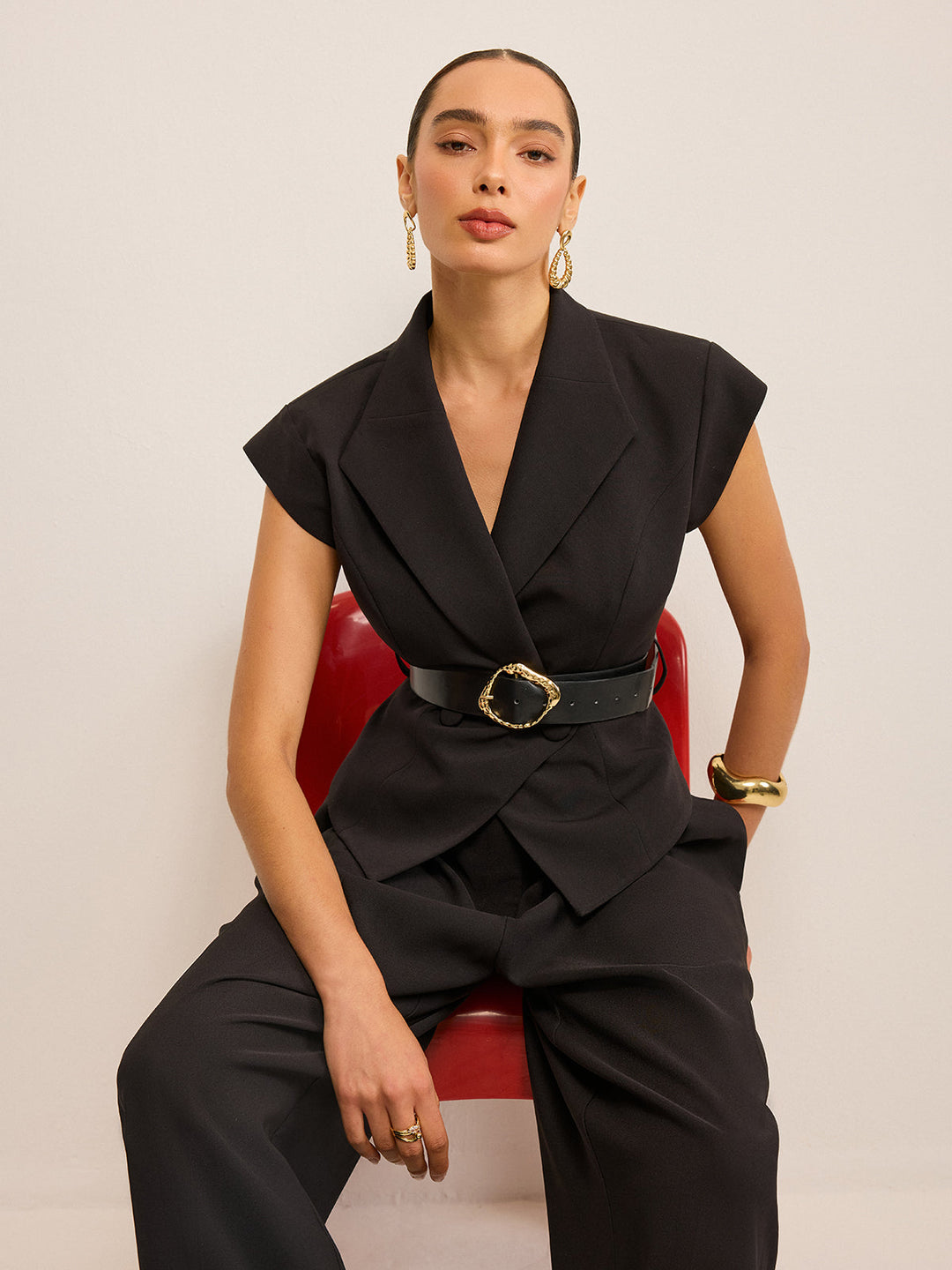 Belted Peplum Vest with Metal Buckle Detail — women's vests, front view