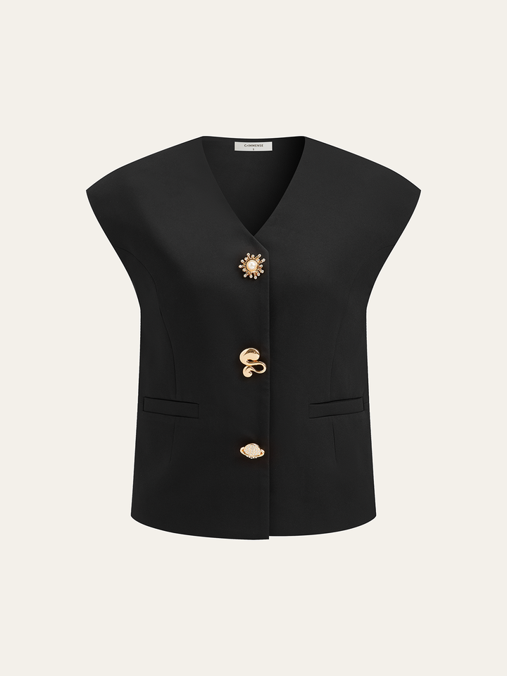 Black V-neck cap sleeve vest with three gold sculptural buttons and welt pockets, front flat shot