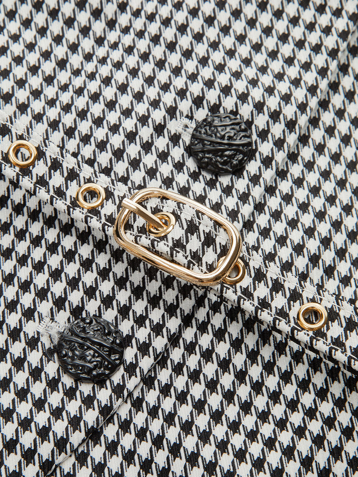 Macro of the black and white houndstooth check fabric used for this belted collar vest