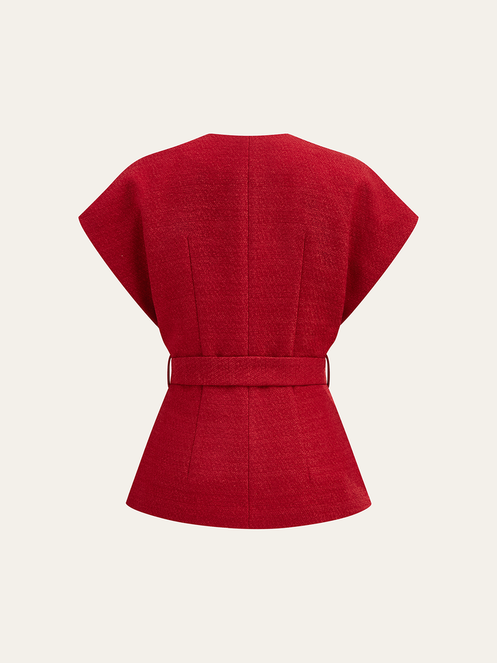Achterkant rood tweed vest met kapmouwen, riemlussen en uitlopende zoom
