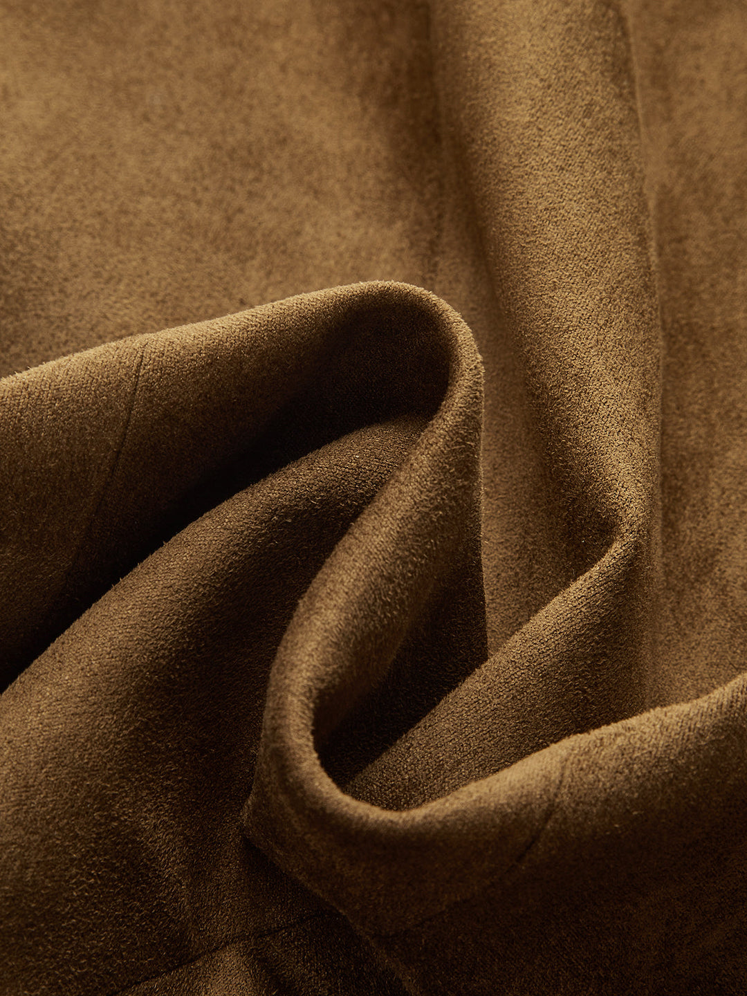 Draped macro of the soft brown faux suede fabric used for the vest