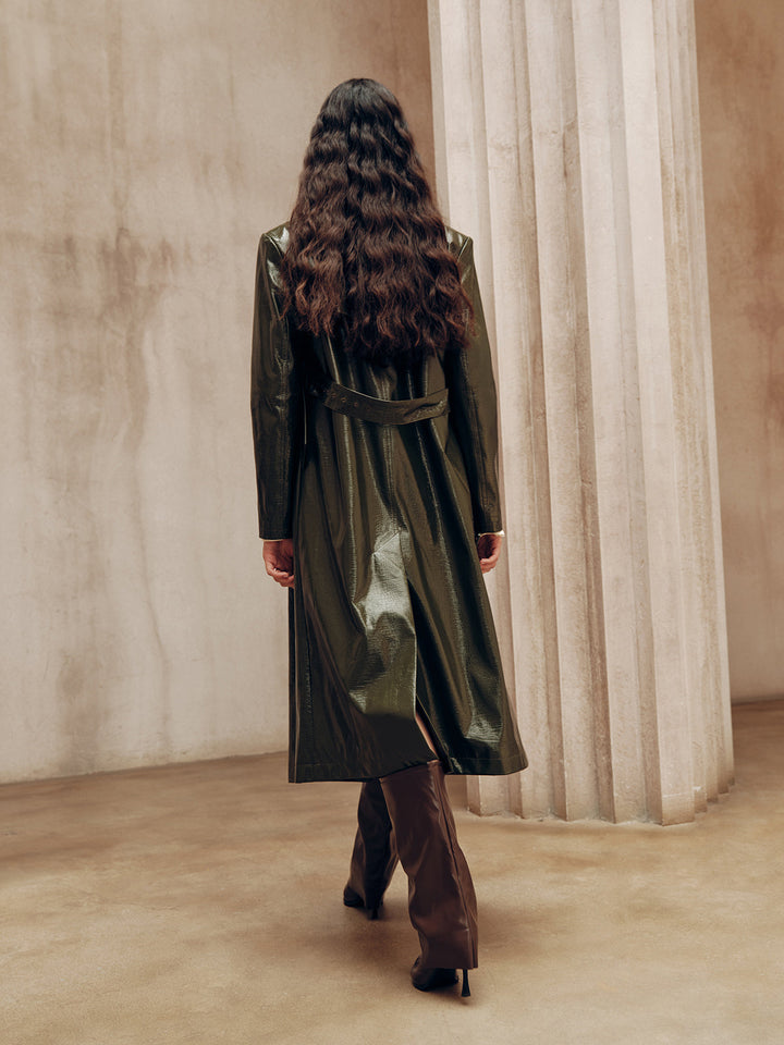 Back view of the belted army green leather coat with centre back vent and waist strap