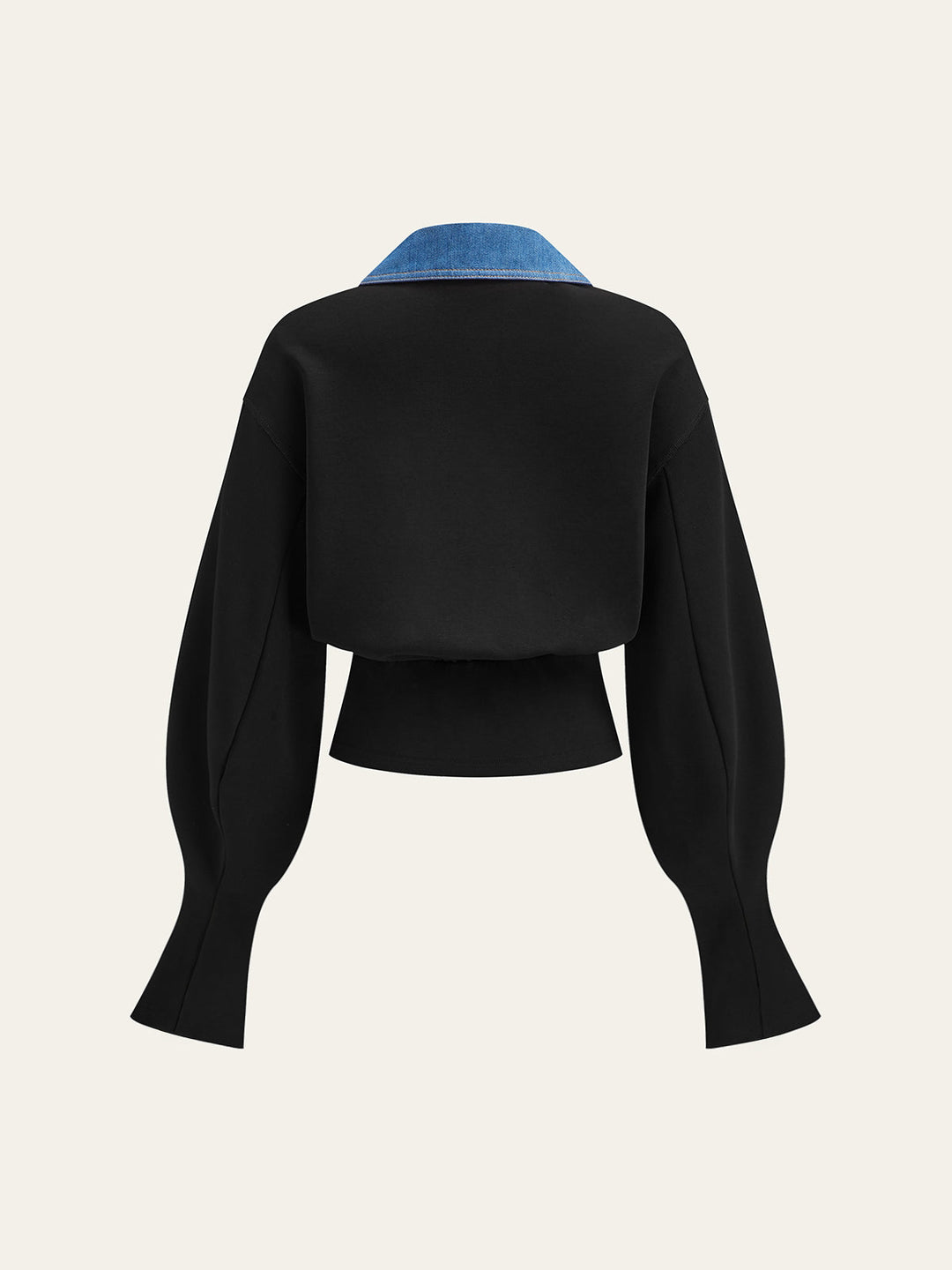 Back view of the black puff sleeve cropped top with denim collar