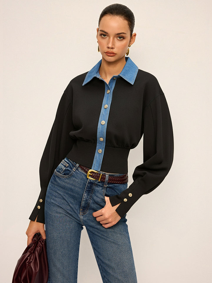 Black cropped blouse with blue denim collar and gold buttons, worn with jeans