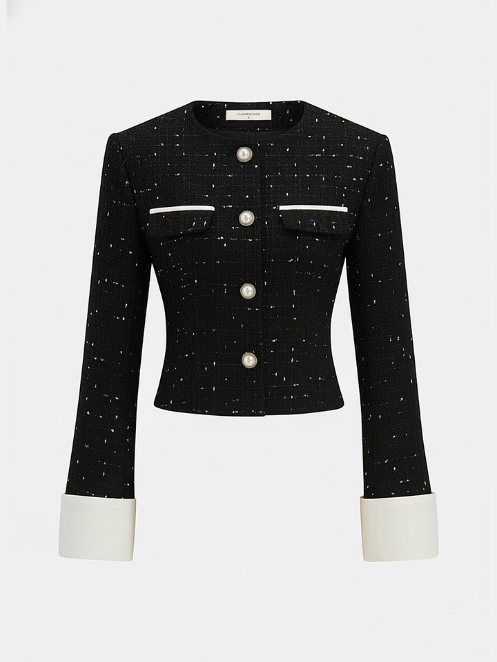 Black tweed pearl button jacket variant with white contrast cuffs and chest pockets
