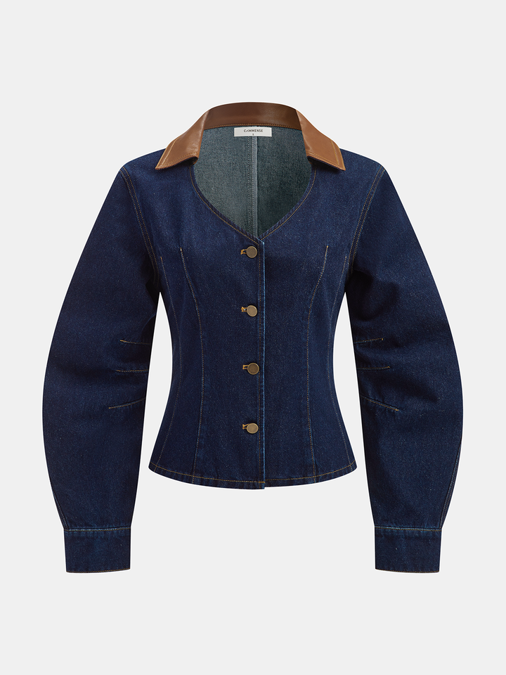 Front product shot of navy denim jacket with brown leather-look contrast collar and brass buttons