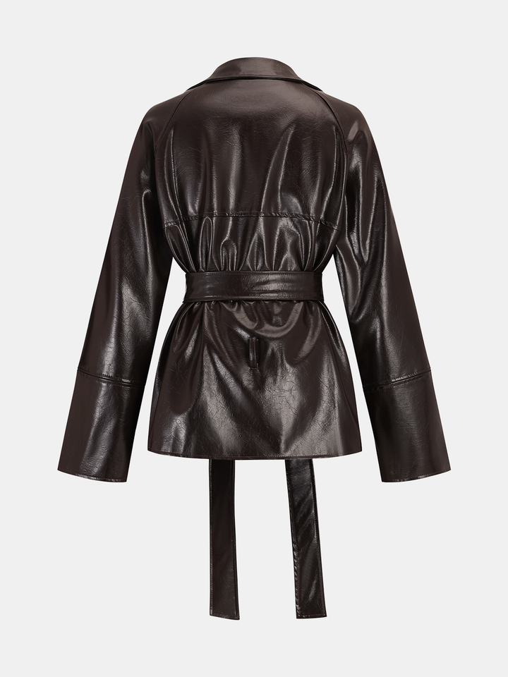 Back view of the brown belted leather coat with gathered waist and back yoke seam