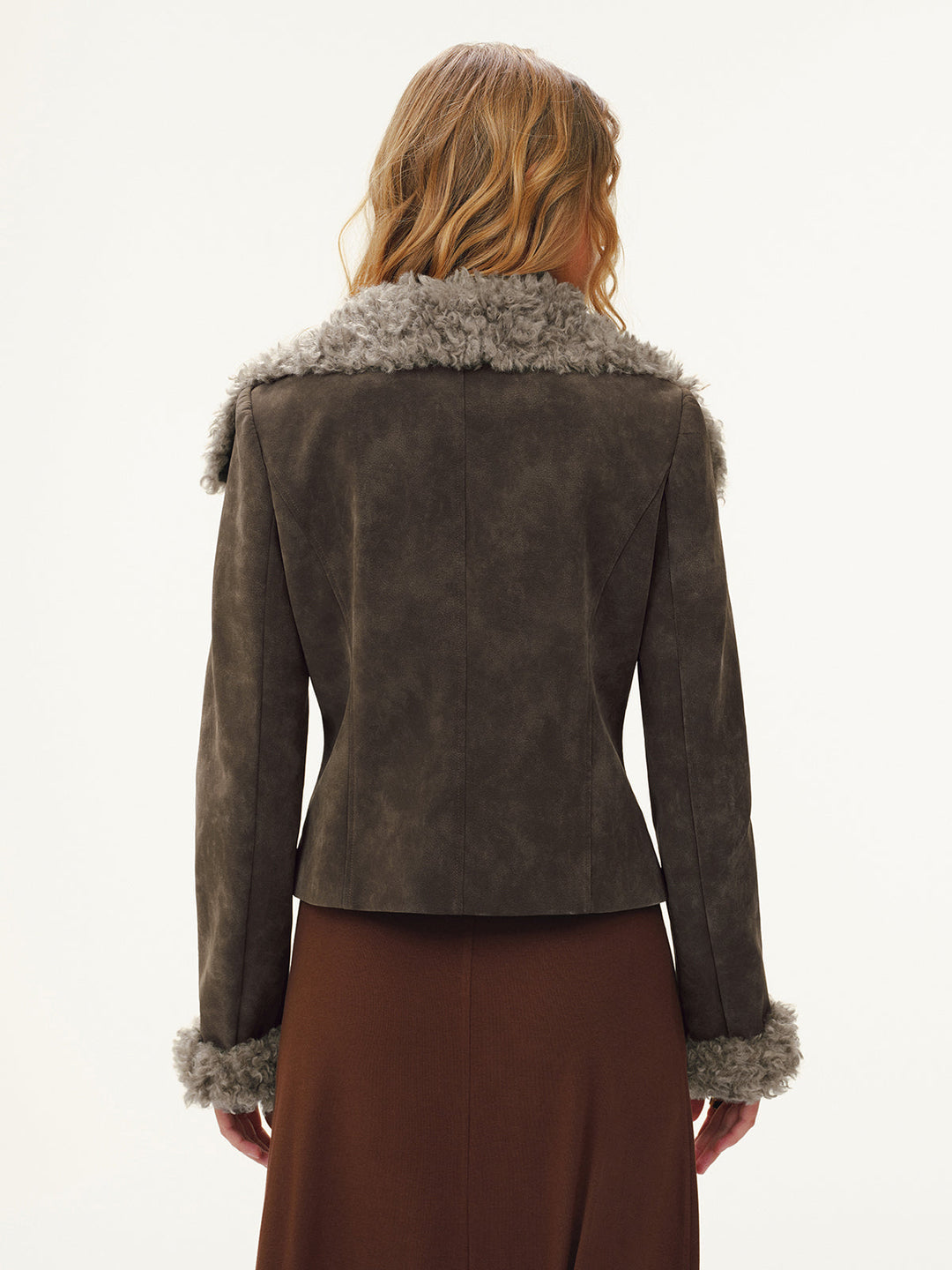 Back view of the short brown suede jacket with grey shearling collar and fur-trimmed sleeves