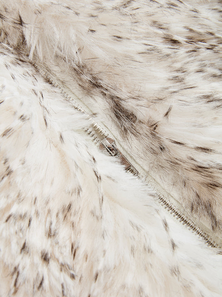 Close-up of the concealed zip front hidden in the faux fur of the sleeveless vest