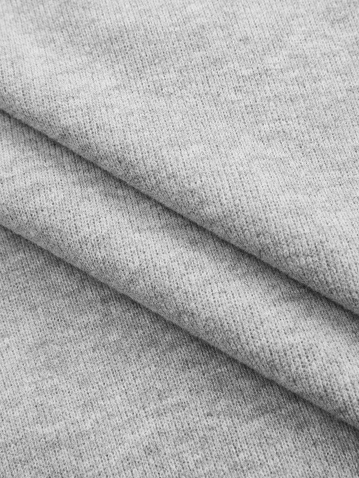 Macro of soft grey marl cotton blend sweatshirt fabric used for this hoodie