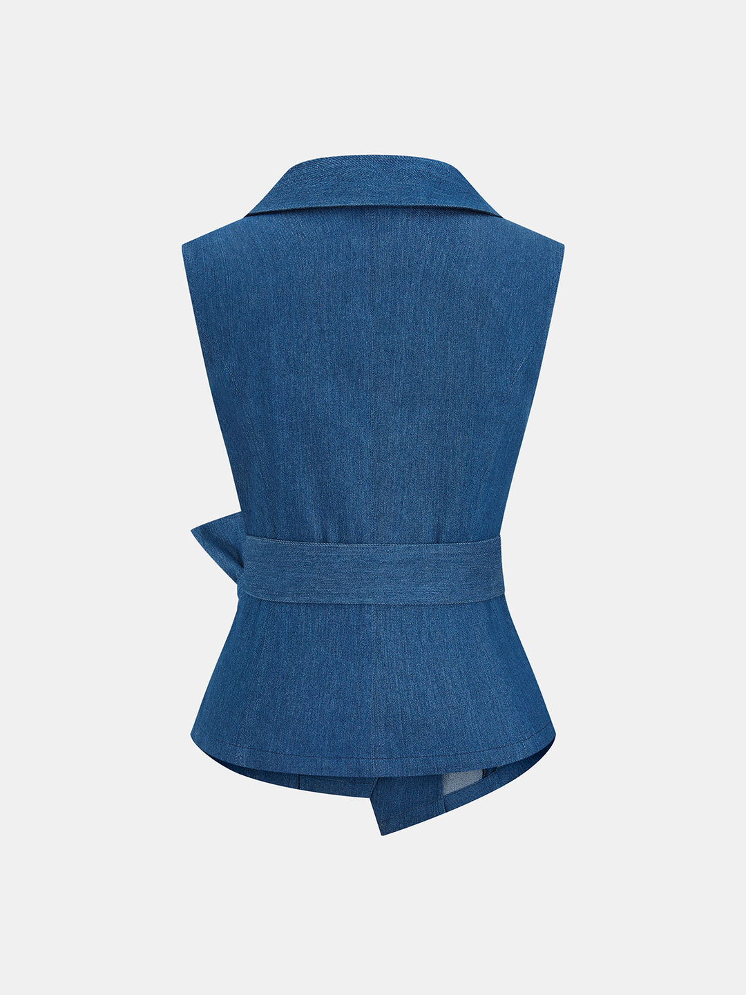 Back view of the blue chambray wrap vest showing the tie belt across the waist and peplum hem