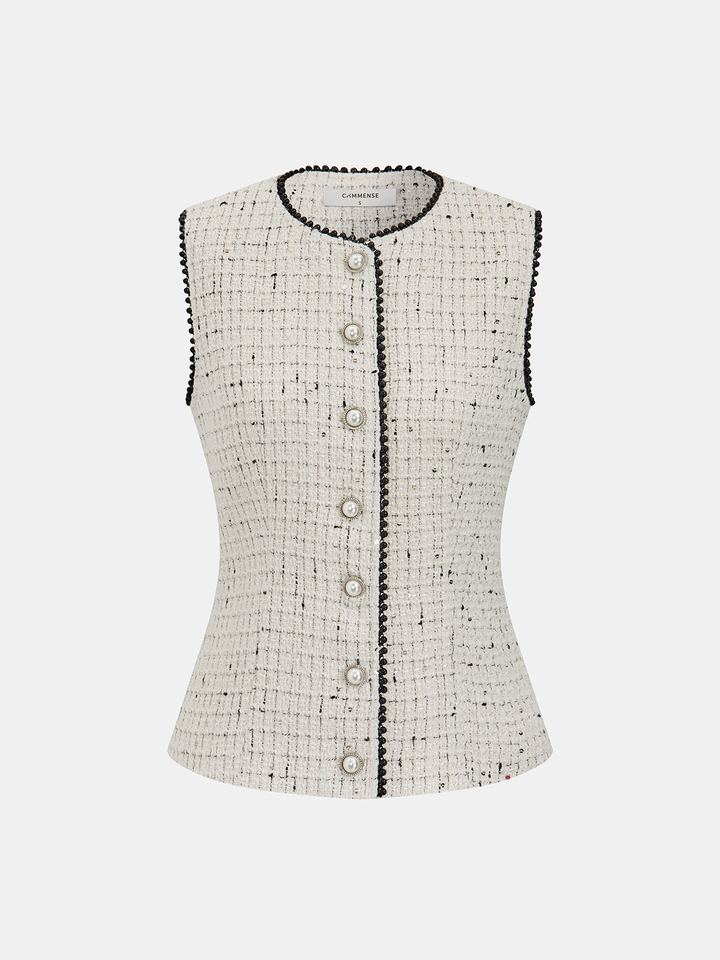 Off-white tweed sleeveless vest with black braid trim and pearl buttons