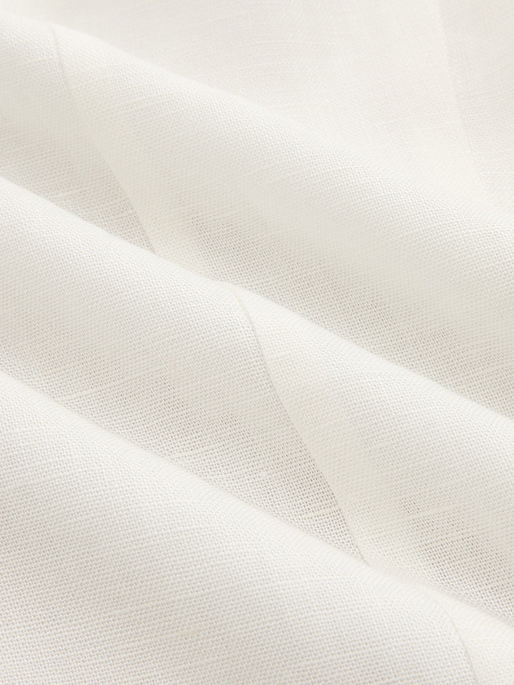 Macro of the natural ivory linen blend fabric used for this lace panel blazer vest