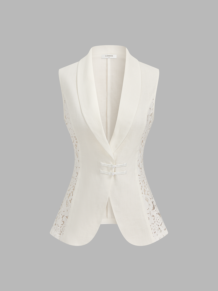 Front view of the ivory frog button waistcoat showing lace inserts and open lapel