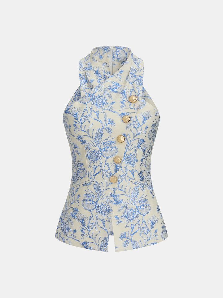 Front flat of cream halter vest with blue toile floral jacquard and gold buttons