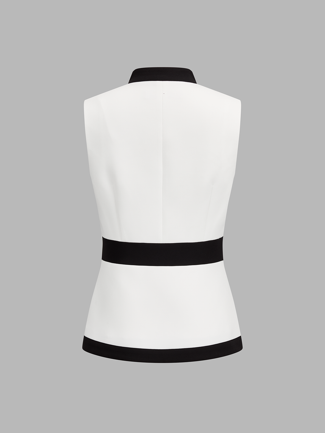 Back view of the white colour block sleeveless vest with black waistband and hem trim