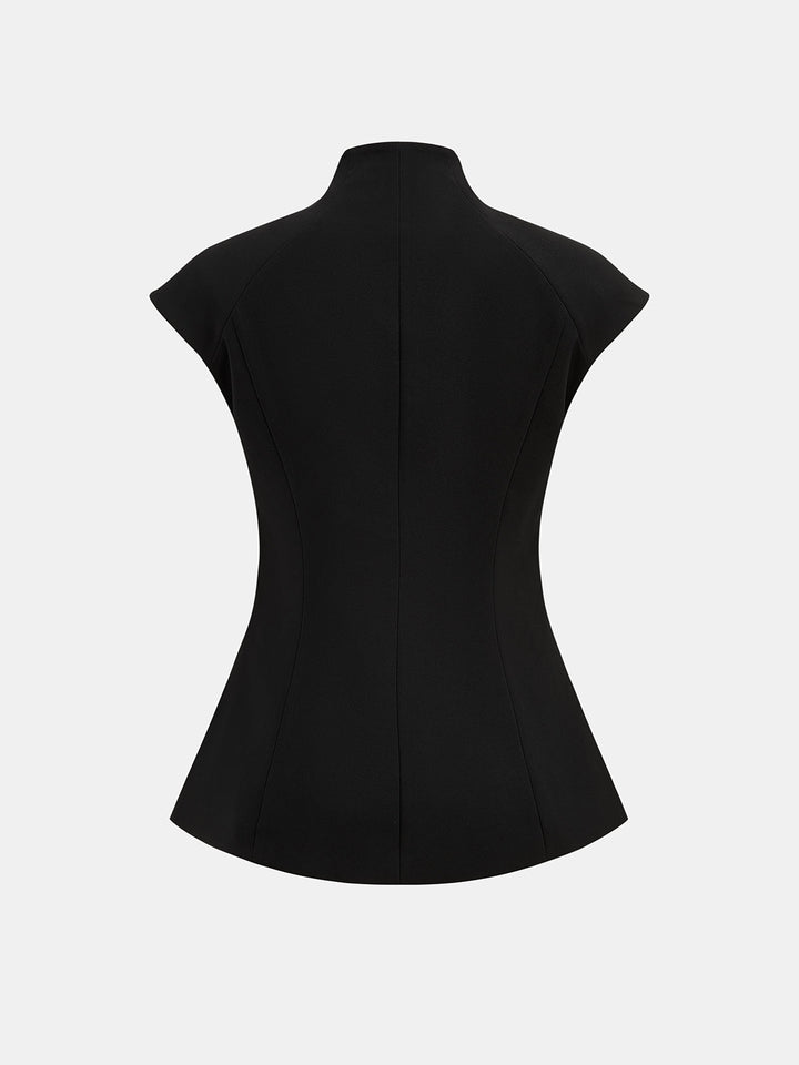 Back view of black fitted peplum top showing stand collar and princess waist seams