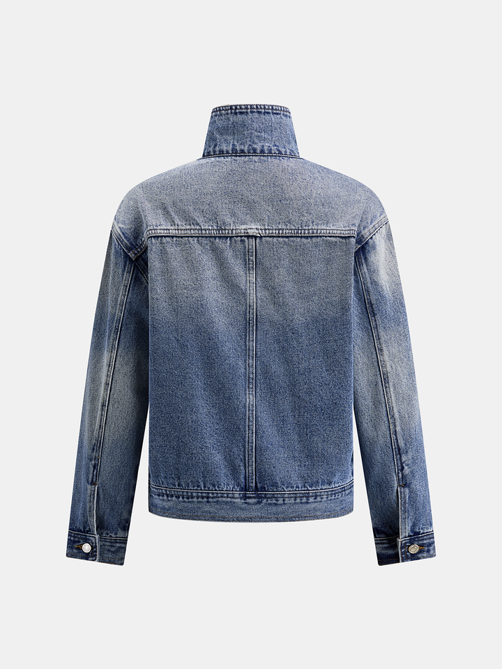Back view of the mid-blue denim jacket with high collar and yoke seam