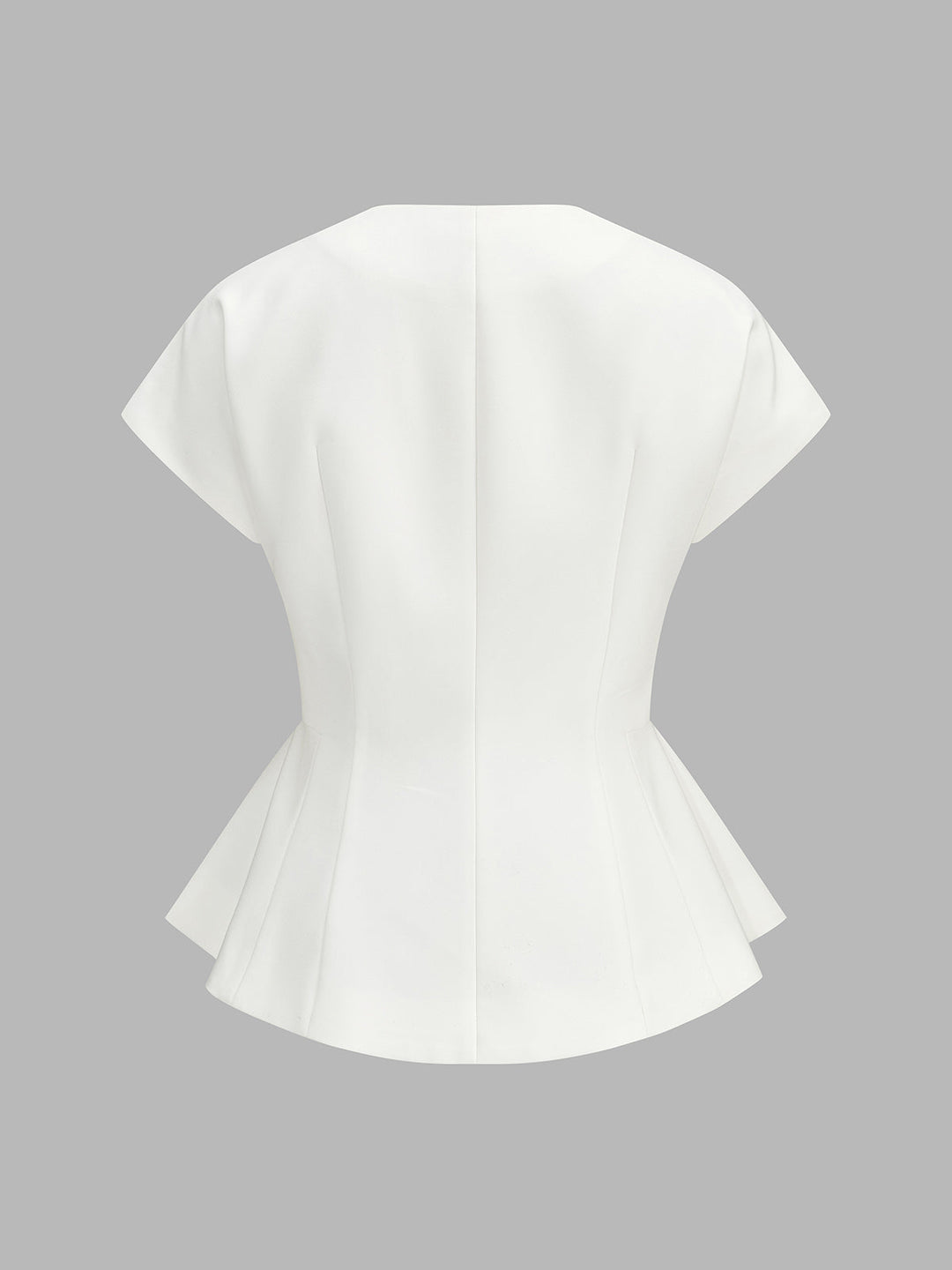 Back view of ivory cap sleeve top showing flared peplum hem and shaped waist seams