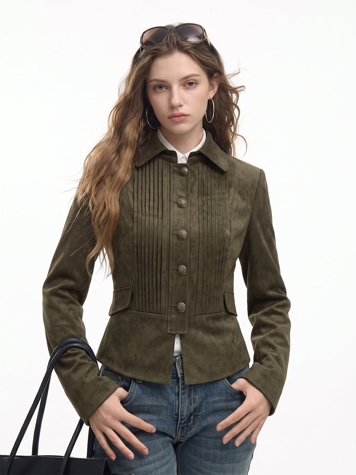 Model in an olive green faux suede cropped jacket with pintuck pleats, styled with blue jeans