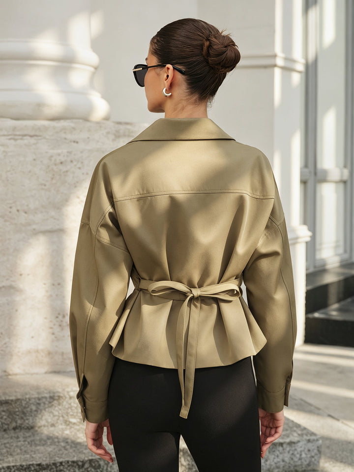Back view of the belted khaki utility jacket with waist tie