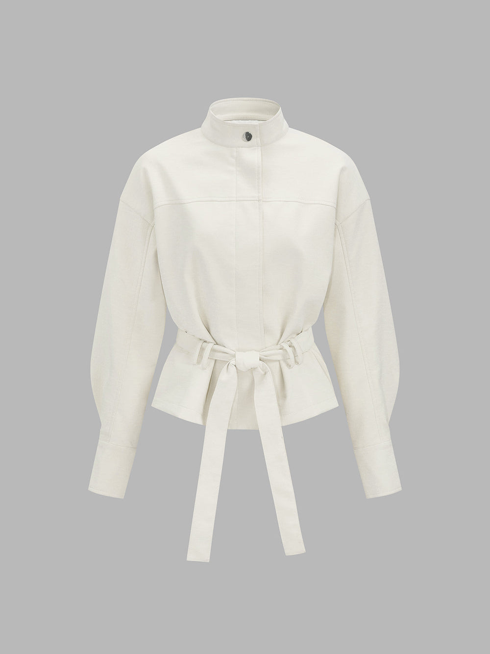Front product view of ivory leather look jacket with stand collar and tie belt