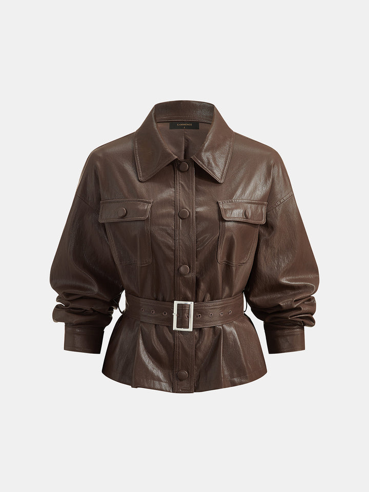 Front product view of chocolate leather look jacket with flap chest pockets and waist belt
