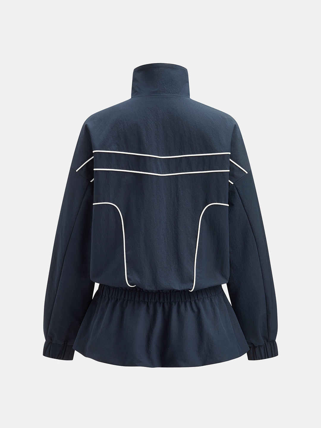 Back view of the dark blue piped jacket showing the curved panel lines and ruffled hem