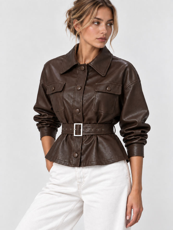 Brown belted jacket worn with sleeves pushed up, cinched waist and peplum hem