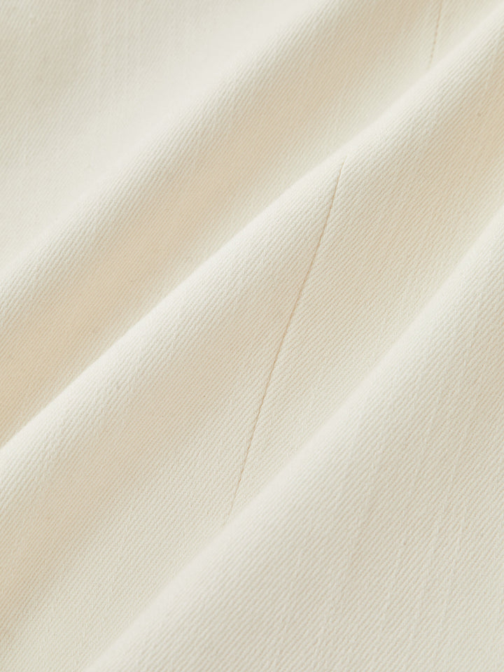 Fabric close-up showing the soft ivory cotton twill weave of the napoleon lace jacket