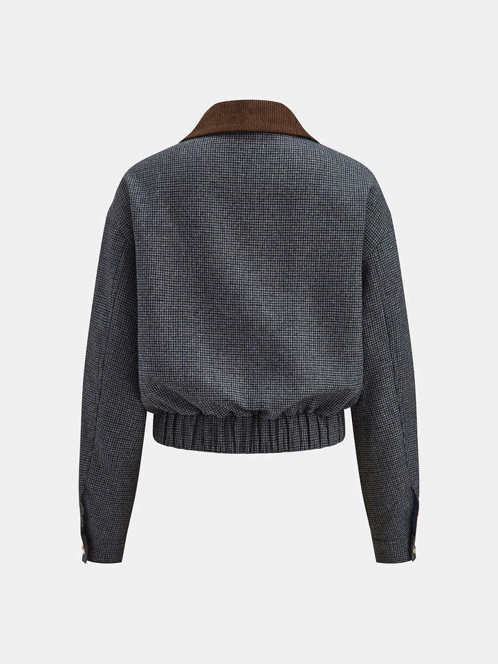 Back view of the cropped houndstooth jacket with ribbed hem
