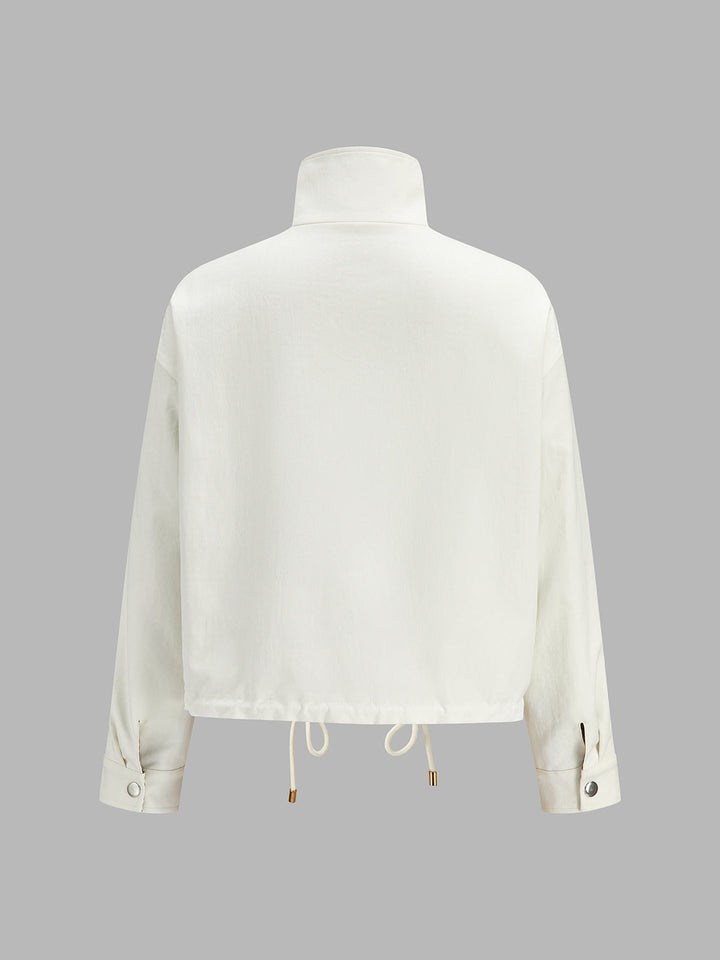 Back view of cream cropped jacket with dropped shoulders and drawstring hem